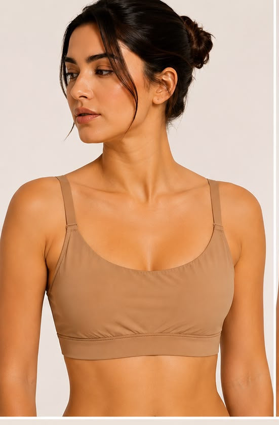 Woman wearing a beige bra with Fitoshape branding and product details.
