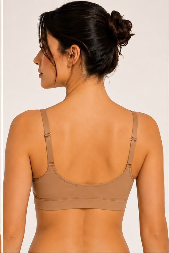 Woman wearing a beige bra with Fitoshape branding and product details.
